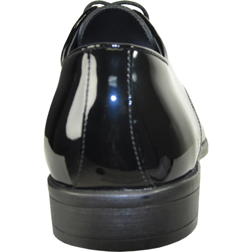 Black patent leather dress shoe on a white background