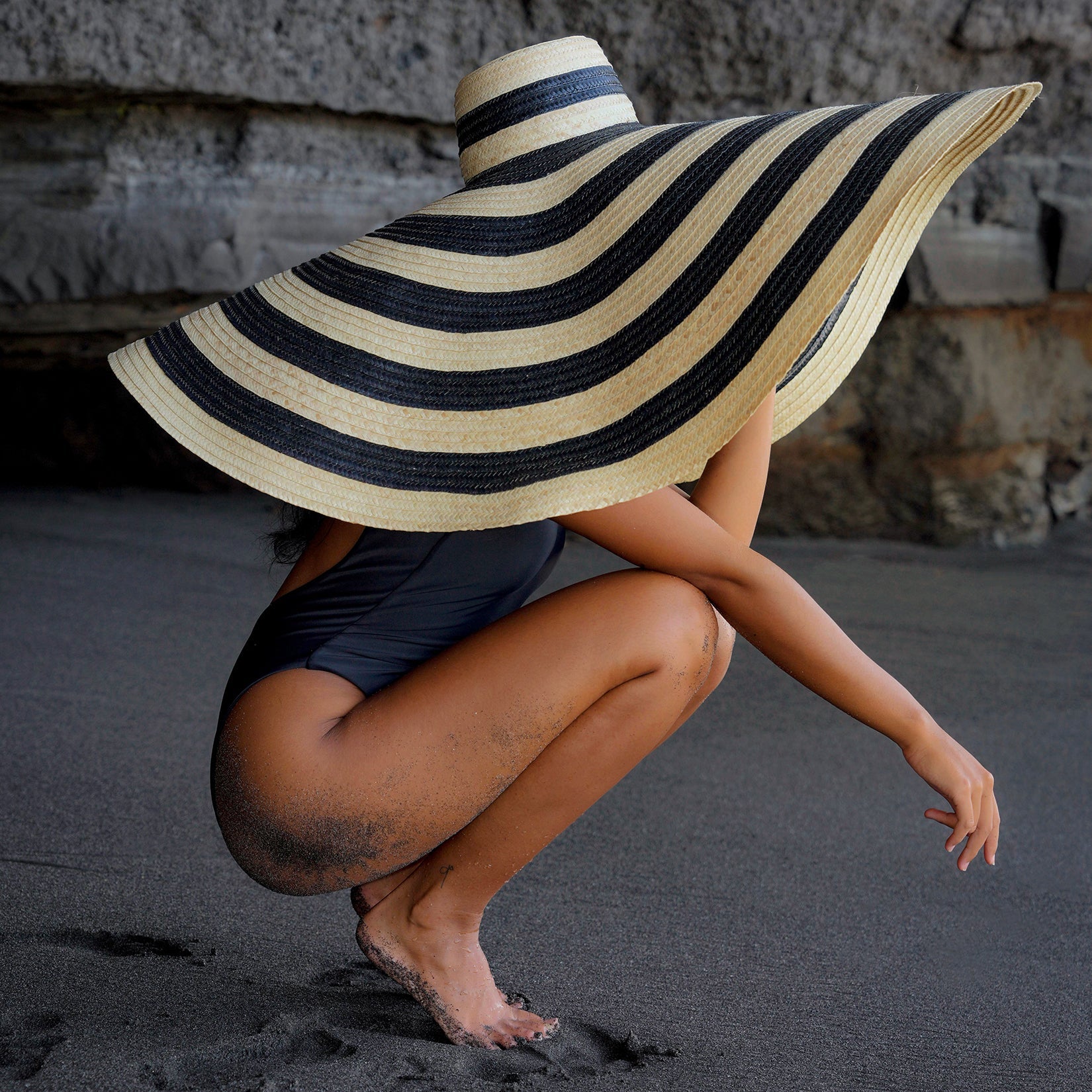 The Solana Oversized Striped Straw Hat in Black & Natural